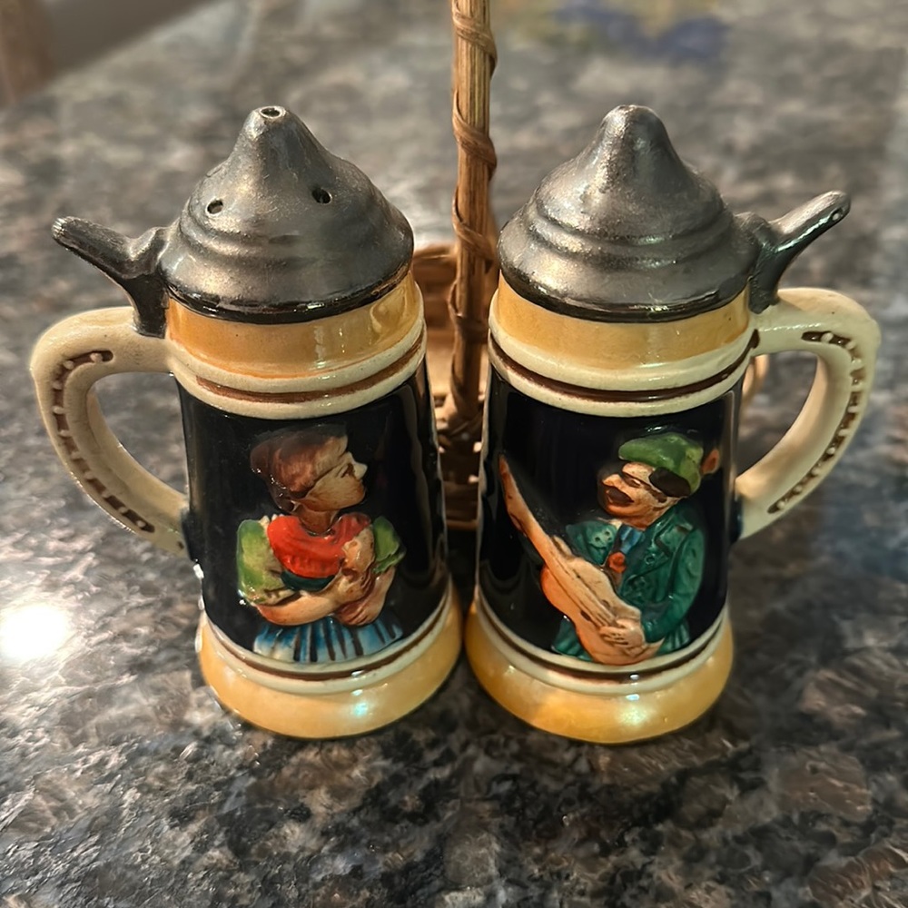 Vintage Stein salt pepper shakers in basket